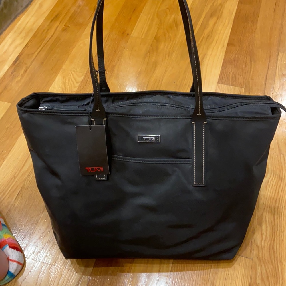 Brand new with tags black Tumi shoulder bag